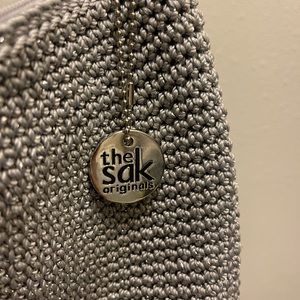 The Sak. Shimmer silver crossbody bag.